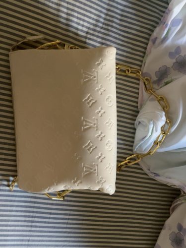 Click to view full screen Louis Vuitton M21262 Coussin PM Cream photo review